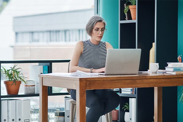 https://tower.10bestpayrollsoftware.com/wp-content/uploads/2024/07/Business-mature-woman-and-laptop-in-office-for-financial-planning-company-payroll-or-bookkeeping..jpg